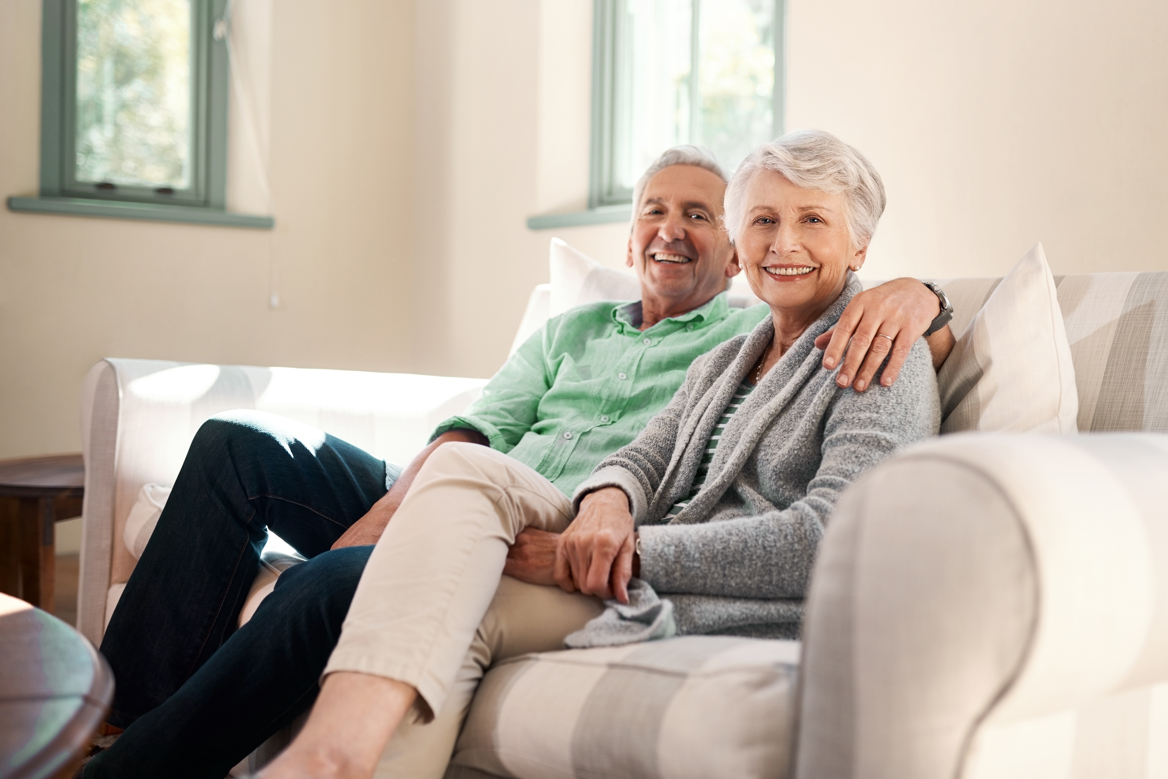 Smiling couple sitting together